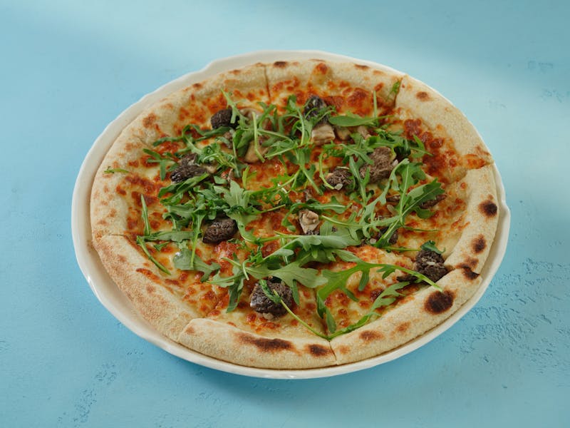 Prosciutto e Rucola pizza with cured ham and rocket