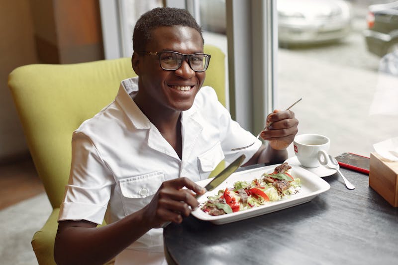 Chef preparing pizza dough in restaurant kitchen